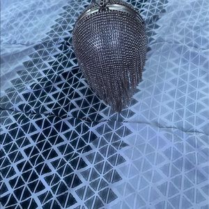 Ball shaped rhinestone purse.